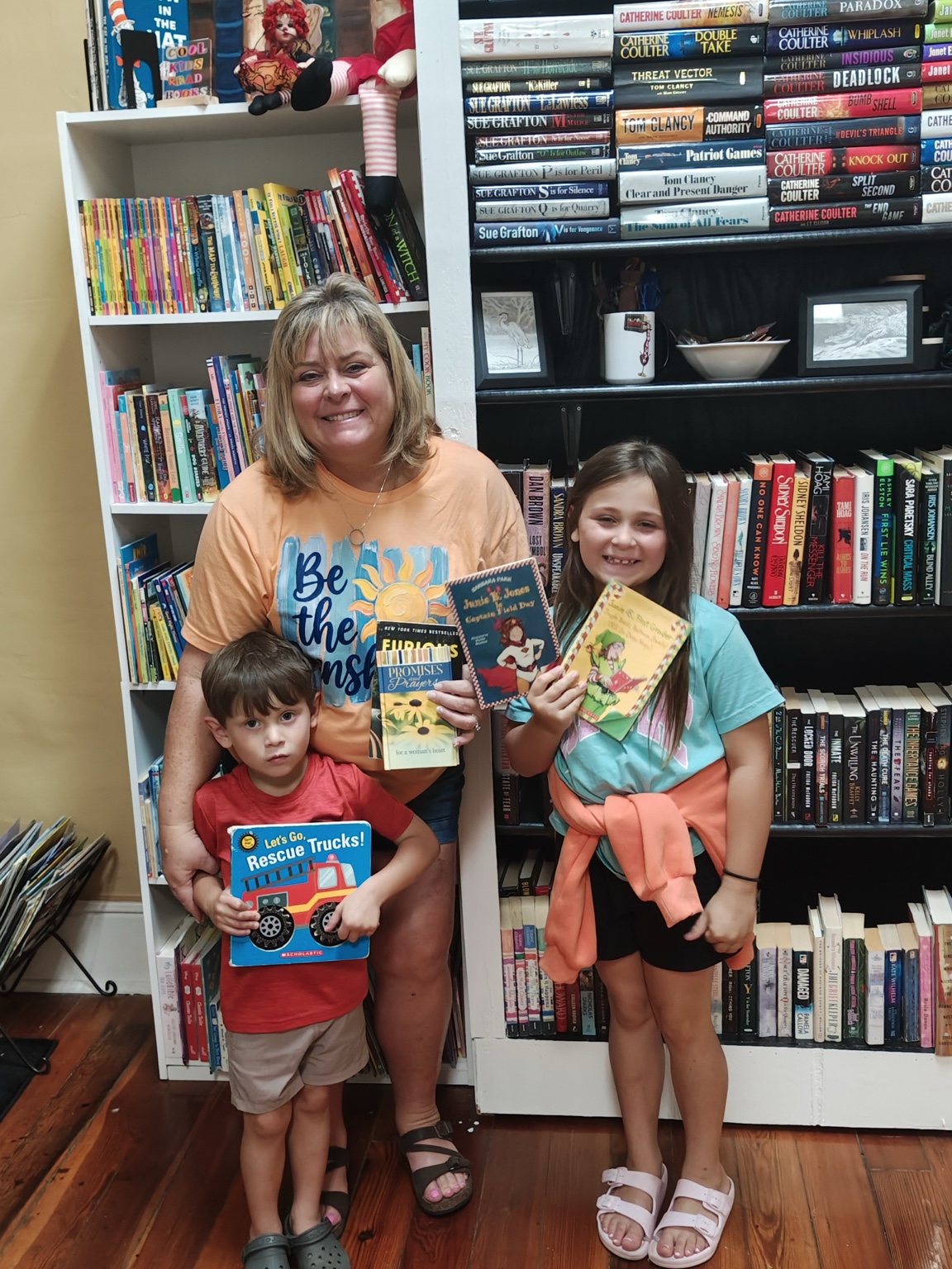 BookLush readers sharing books in the children’s section